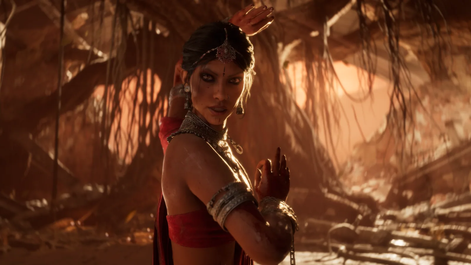 A ritual warrior framed by warm sunset light